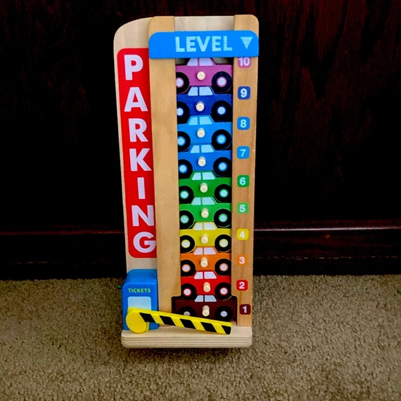 Melissa and Doug garage with ten cars - Picture 1 of 1